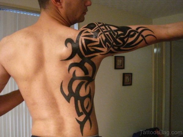Adorable Tribal Shoulder Tattoo For Men