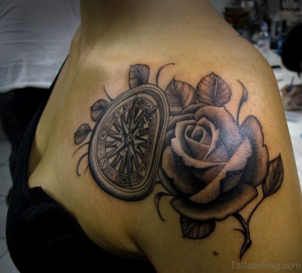 Amazing Rose And Wheel Tattoo Design