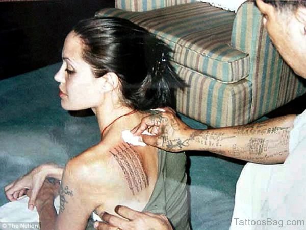 Angelina Jolie Wording Tattoo