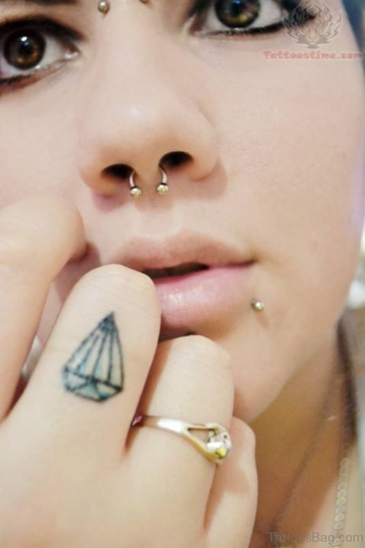 Attractive Diamond Tattoo On Finger