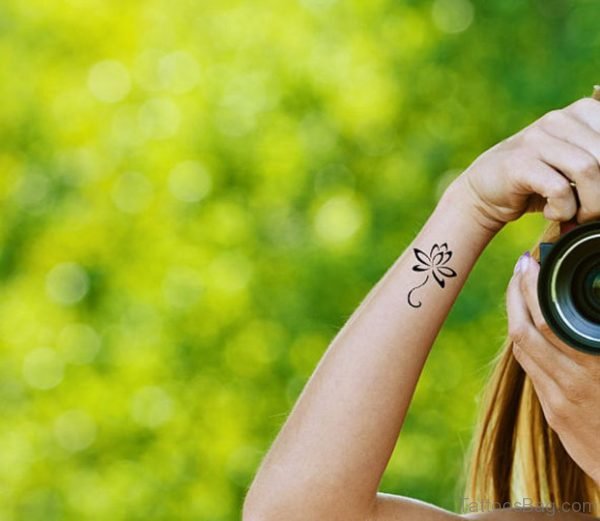 Attractive Lotus Tattoo On Wrist