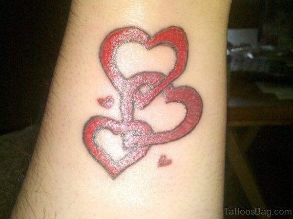 Awesome Red Heart Tattoo On Wrist