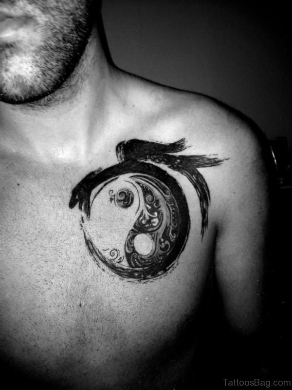 Black Yin Yang Tattoo On Front Shoulder