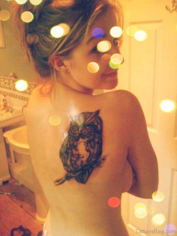 Beautiful Girl Showing Her Owl Tattoo