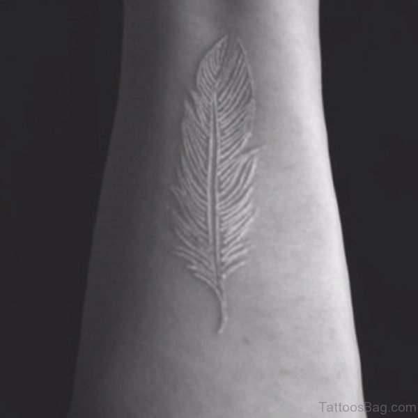 Beautiful White Ink Feather Tattoo