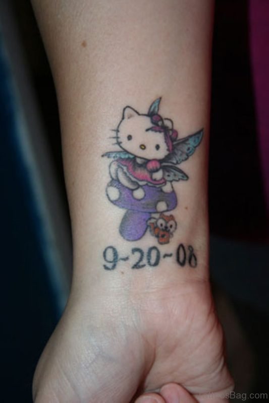 Beautiful And Dated kitty Wrist Tattoo