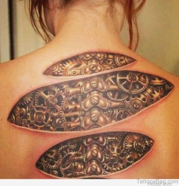 Biomechanical Tattoo On Girl Upper Back