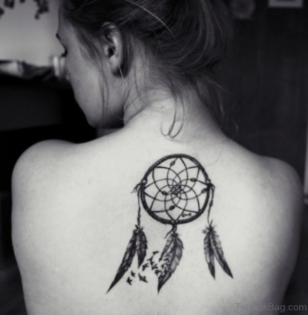 Black And Grey Dreamcatcher Tattoo On Back For Girls