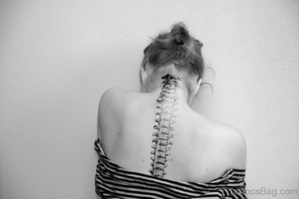 Black And White Spine Tattoo