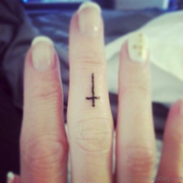 Black Cross Tattoo On Finger 