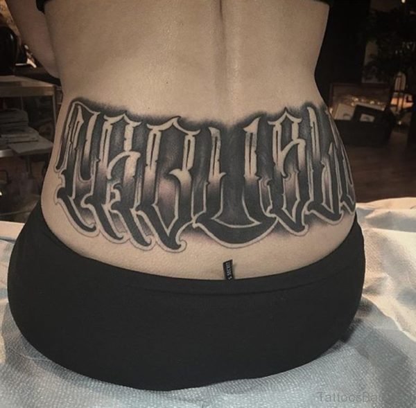 Black Ink Word Tattoo On Lower Back