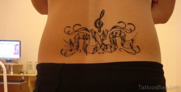 Black Music Notes Tattoo On Lower Back