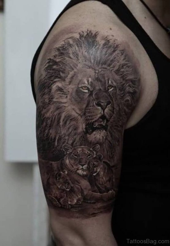 Black Stunning Lion Face Shoulder Tattoo