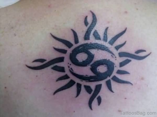 Black Sun Shoulder Tattoo