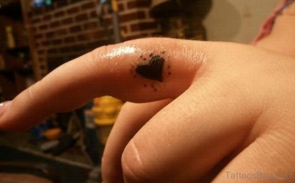 Black Tiny Heart Tattoo