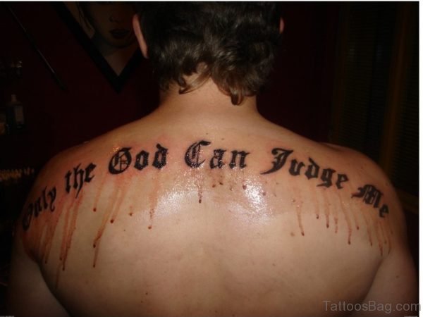 Black Wording Tattoo On Back