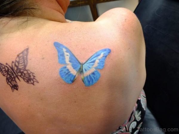 Blue And Black Butterfly Tattoo