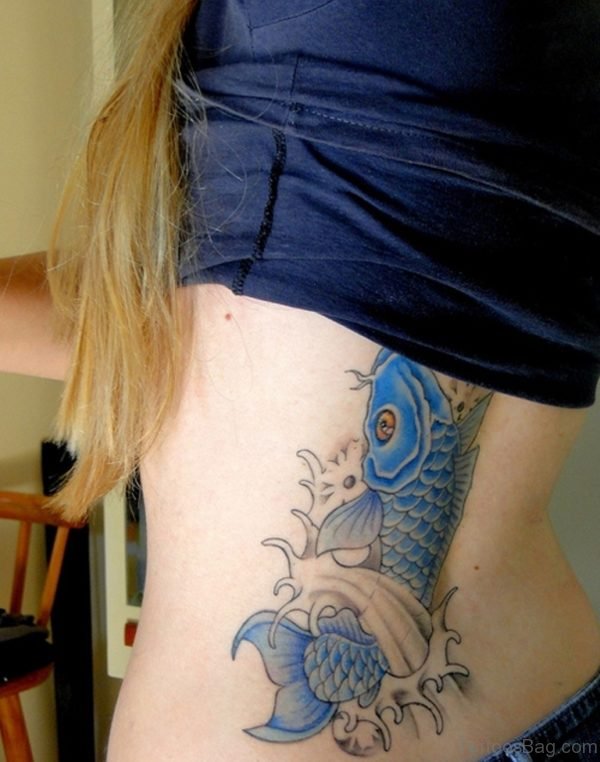 Blue Fish Tattoo On Lower Back