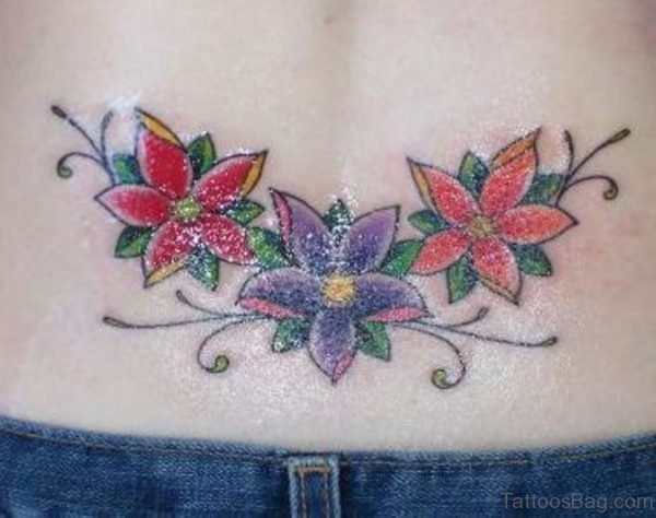 Blue Flower Tattoo On Lower Back