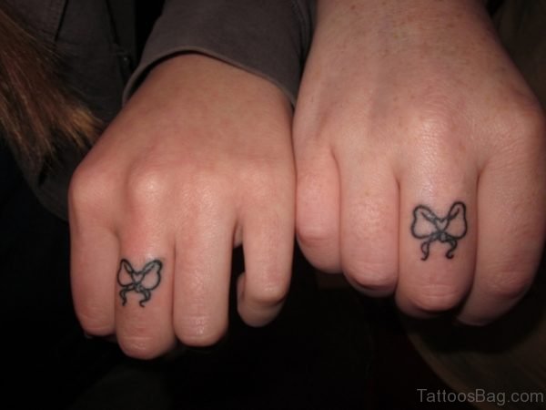 Bow Tattoos On Fingers