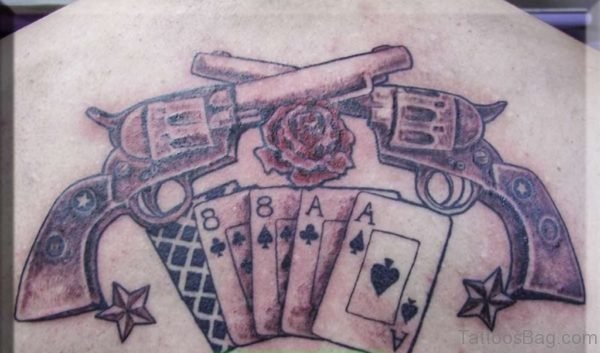 Cards And Gun Tattoo On Back
