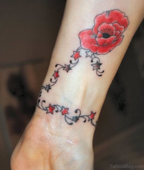 Colored Flower Tattoo On Wrist