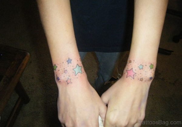 Colored Star Tattoo On Wrist