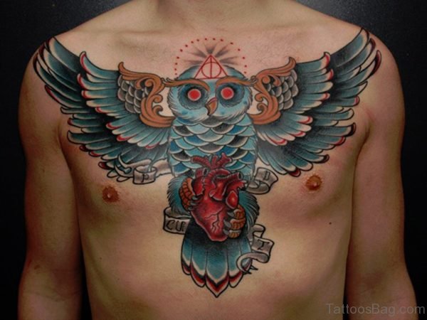 Colorful Traditional Owl With Real Heart Tattoo