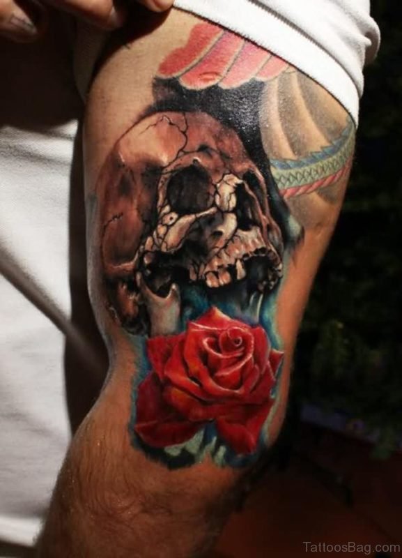 Cracked Skull And Red Rose Tattoo