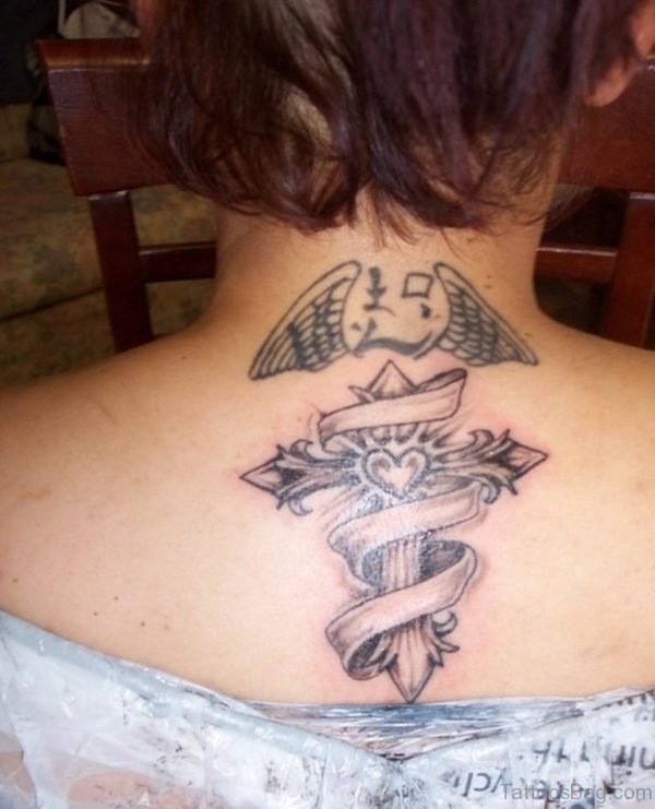 Cross And Wings Tattoo On Back