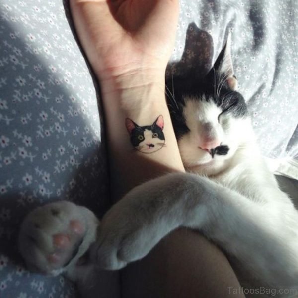 Cute Black  Cat Tattoo On Wrist