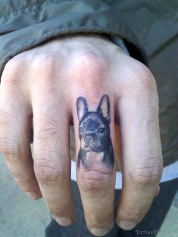 Dog Face Tattoo On Finger