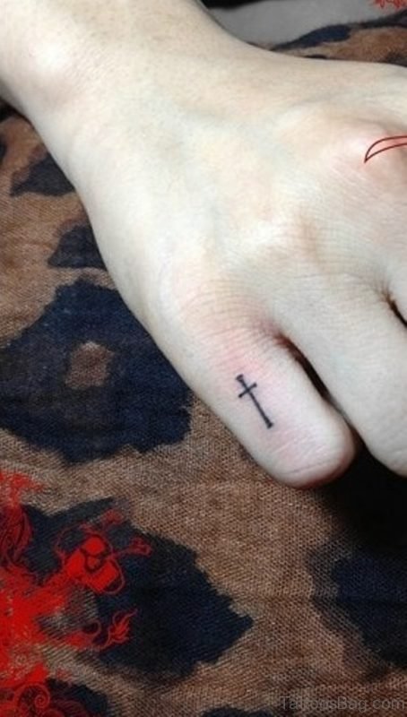Elegant Cross Tattoo On Finger 