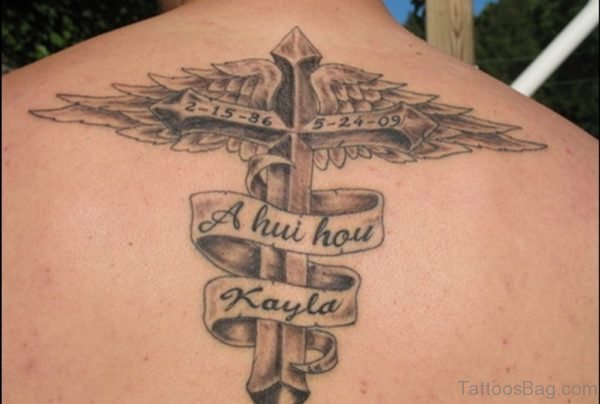 Elegant Cross Wings Tattoo