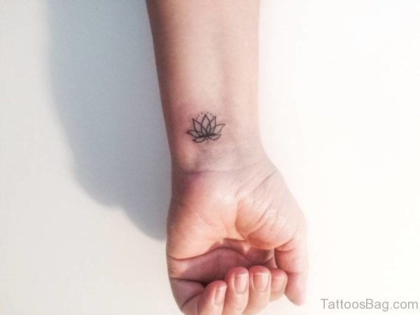 Elegant Lotus Tattoo On Wrist 