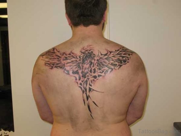 Fancy Phoenix Tattoo On Upper Back