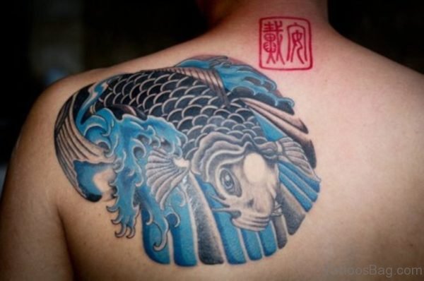 Black & Blue Fish Tattoo On Back