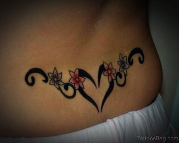 Flower And Heart Tattoo On Lower Back 