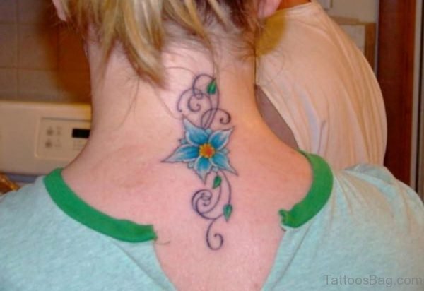 Flower Tattoo On Upper Back