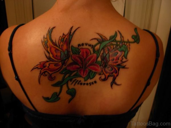 Flowers And Name Tattoo On Back 