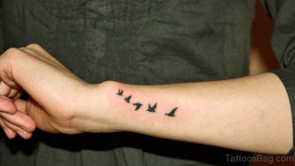 Flying Birds Tattoo On Wrist 
