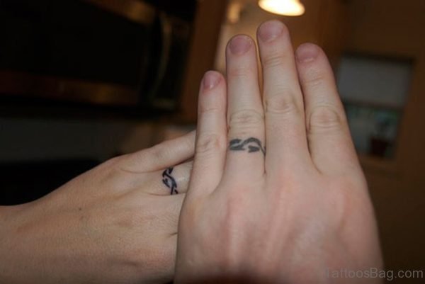 Funky Finger Tattoo
