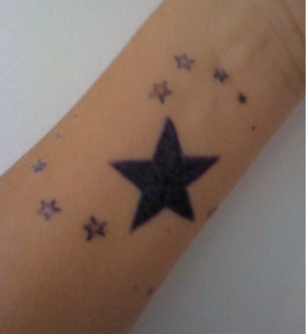 Funky Star Tattoo On Wrist