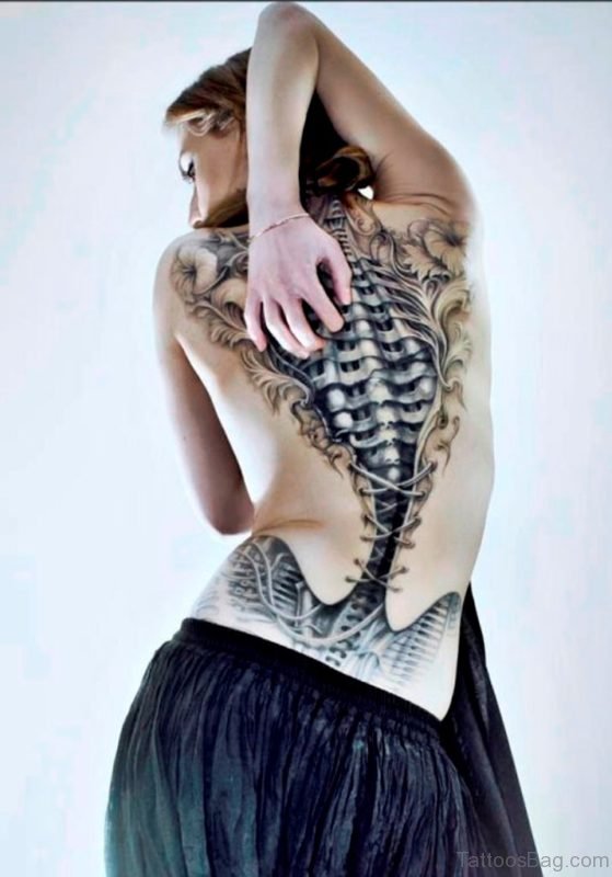 Girl Showing Her Biomechanical Tattoo