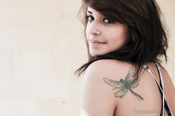 Gorgeous Girl With Outstanding Dragonfly Tattoo