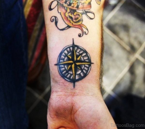 Graceful Compass Tattoo On Wrist