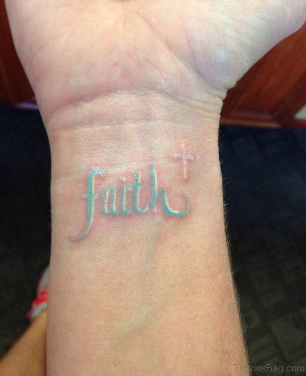 Green Ink Faith Tattoo On Wrist