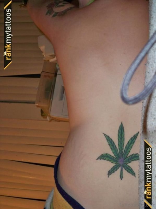 Green Leaf Tattoo On Lower Back