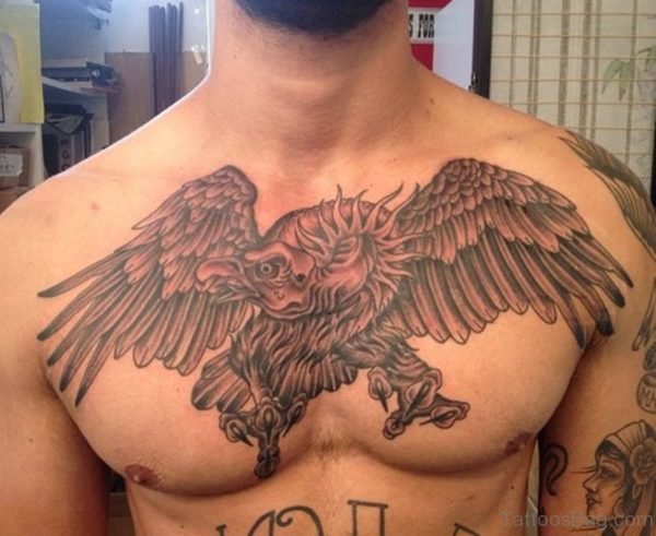 Grey Ink Flying Eagle Tattoo On Chest