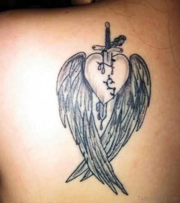 Grey Ink Winged Heart Tattoo